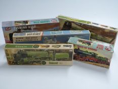 Five Airfix 00 and 1:600 scale plastic model train and ship kits comprising HMS Victorious,