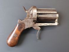 Unnamed 20 bore six-shot pinfire double action pepperbox revolver with engraved decoration, shaped