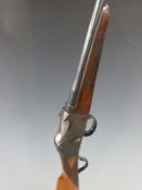Belgian .410 Martini action single barrelled shotgun with chequered grip and forend, storage