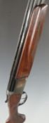 Baikal NX-27E 12 bore over and under ejector shotgun with engraved scenes of birds to the lock,