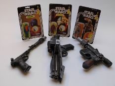 Three Kenner Star Wars figures, all with reproduction cards, together with three replica guns