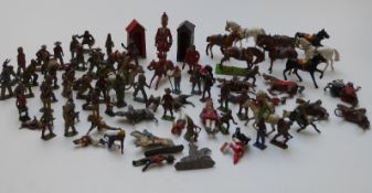 Eighty-two Britains and similar lead model soldiers including cowboys & Indians, cavalry etc
