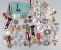 A quantity of mainly original Nazi German WWII badges and regalia