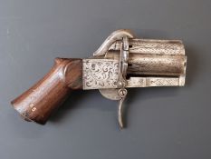 Unnamed 7mm six-shot pinfire pepperbox revolver with all over engraved scrolling decoration, frame