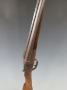 J.Newmark 12 bore side by side shotgun with chequered grip and forend, double trigger and 28 inch
