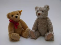 Two Steiff Teddy bears, one with white mohair, jointed limbs and growler, limited edition 2737/