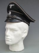 WWII German SS officer's peaked cap with SS motif to interior and RZM SS stamped to peak and with