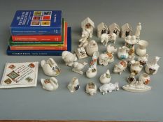 A collection of Crested Ware, includes examples by Goss and Arcadian, mostly animal or bird