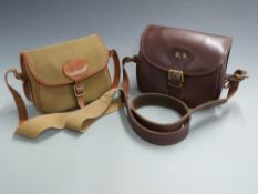 Two shooting/ shotgun cartridge bags one, brown leather the other canvas and leather, both with