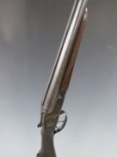 Czechoslovakian 12 bore side by side shotgun with sidelock, chequered grip and forend, double
