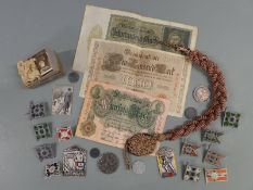A quantity of WWII Nazi German flag tinnies, shooting cord and currency