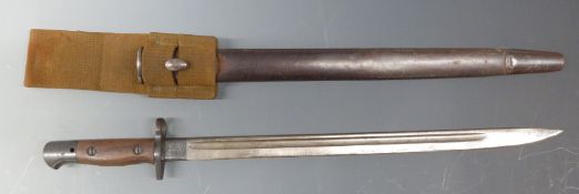 British Army 1907/ patterned bayonet in scabbard complete with webbing frog. Blade length 43cm.