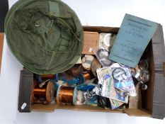 Collection of fly tying equipment including vices, salmon and sea trout flies, capes, rolls of