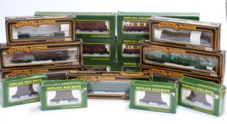 Seventeen Mainline and Replica Railways 00 gauge coaches, wagons and vans, all in original boxes