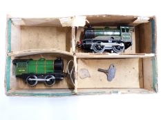 Two Hornby 0 gauge clockwork 0-4-0 locomotives 45746 and 50153.