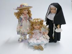 Sixteen The Leonardo Collection porcelain collectors' dolls, in original boxes