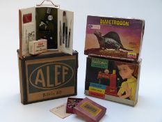Five vintage childrens toys and games including Merit Microscope with specimen slides, Vulcan Senior
