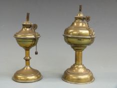 Two small brass oil lamps, one with Star of David to the wick adjustment knob, tallest 22cm
