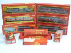 Sixteen Tri-ang Hornby 00 gauge coaches, wagons and accessories together with a Tri-ang Minic