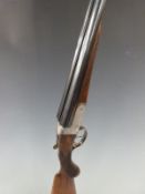 Midland Gun Co 12 bore side by side shotgun with named and engraved locks, engraved underside,