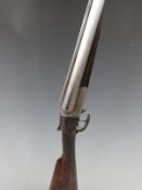 Henry Tolley 12 bore side by side shotgun with named and engraved lock, chequered grip and forend,