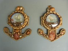 A pair of wall plaque pictures of 19thC yachts in the form of anchors, highly decorated with sea