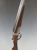 Midland Gun Co 12 bore side by side ejector shotgun with named and engraved locks, engraved