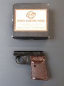 Webley Sports .22 starting pistol with named and chequered Bakelite grips, in original box.