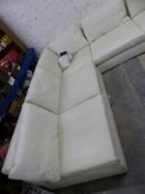 Modern white leather style corner sofa and a similar chair