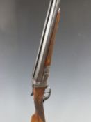 Unnamed 12 bore side by side shotgun with engraved locks, underside, top plate, top lever and