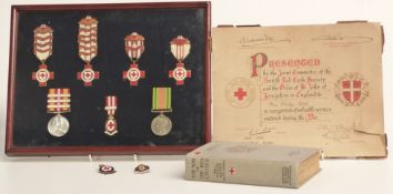 A framed Red Cross medal collection awarded to Gladys Fitch including Voluntary Medical Service Long