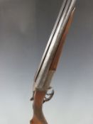 George Bate 12 bore side by side shotgun with chequered grip and forend, double trigger and 28