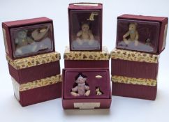 Ten Enesco Steiff Teddy bear figures, all in original boxes.
