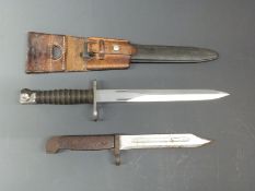 Swiss M57 bayonet marked FW to blade and KV144 to ricasso, with scabbard and frog, blade length 24cm