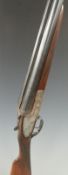 Silver Sable 12 bore side by side ejector shotgun with named and engraved sidelock, chequered grip