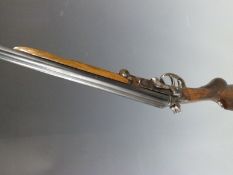 Parkemy .410 side by side hammer action folding shotgun with chequered semi-pistol grip, double