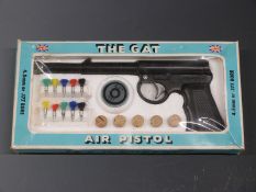 T J Harrington & Co The Gat .177 air pistol, in original box with corks and arrows.