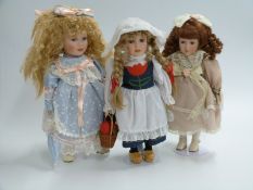 Sixteen The Leonardo Collection porcelain collectors' dolls, in original boxes