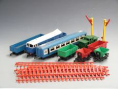 A large collection of 0 gauge locomotives, coaches, wagons, track and accessories including The Blue