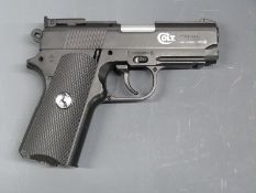 Umarex Colt Defender .177 air pistol, serial number 11001288, with original instruction booklet.