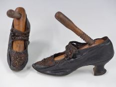 A pair of Victorian beaded ladies shoes with trees