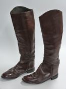 A pair of brown leather hunting/ riding boots, size 10.