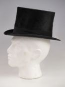A vintage beaver skin top hat