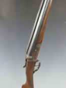 Elbar 12 bore side by side shotgun with engraved lock, chequered grip and forend and 27.75 inch