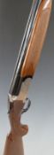 Luigi Franchi 12 bore over and under shotgun with named lock, all over scrolling engraving,