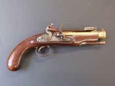 Flintlock brass barrelled blunderbuss pistol with sprung loaded bayonet, engraved lock hammer and