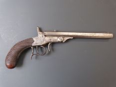 Percussion hammer action 5.2mm saloon or gallery pistol with chequered grip, wrist cartouche,