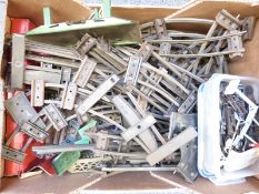 A collection of Hornby 0 gauge track, points, wagons and accessories, some in original boxes