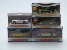 Five Matchbox The Dinky Collection diecast model sports cars including 1960 Jaguar XK150 Drop-Head