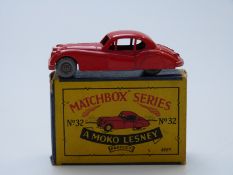 Matchbox Moko Lesney 1-75 series diecast model Jaguar XK140 with red body and grey wheels 32, in